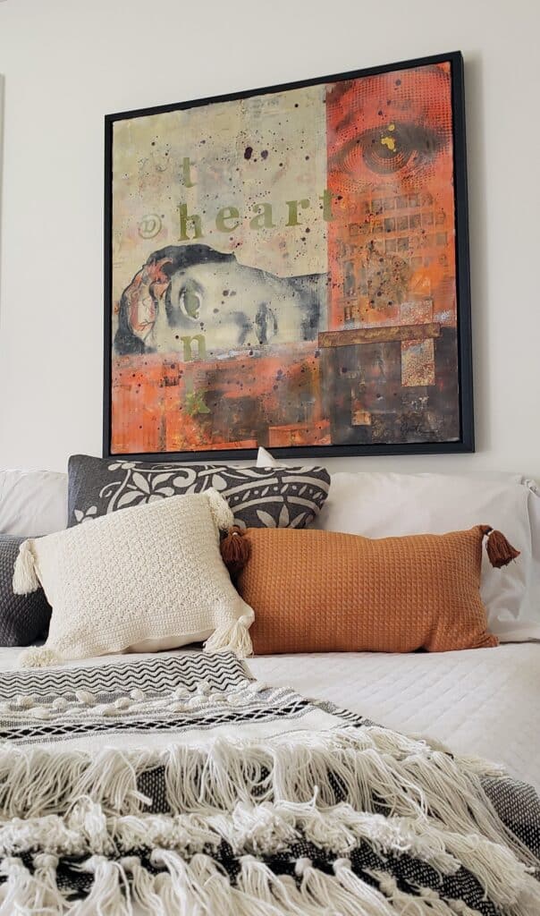 Bedroom with cushions on the bed