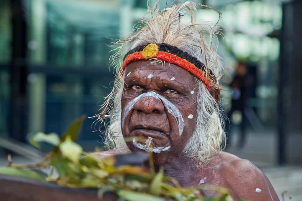 Aboriginal elder Uncle Max Eulo performs a smoking ceremony at an urban regeneration event in White Bay. He has also performed for the pope and Oprah Winfrey.