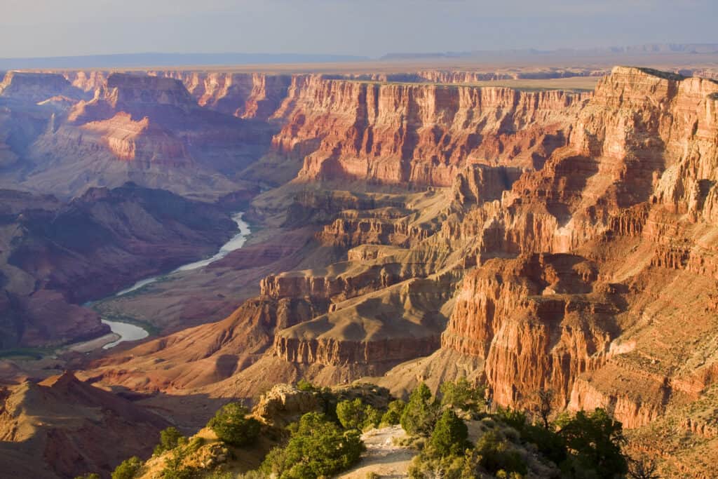 Beautiful Landscape of Grand Canyon from Desert View Point with the Colorado River visible during dusk. This is ideal for vacations with grandparents.