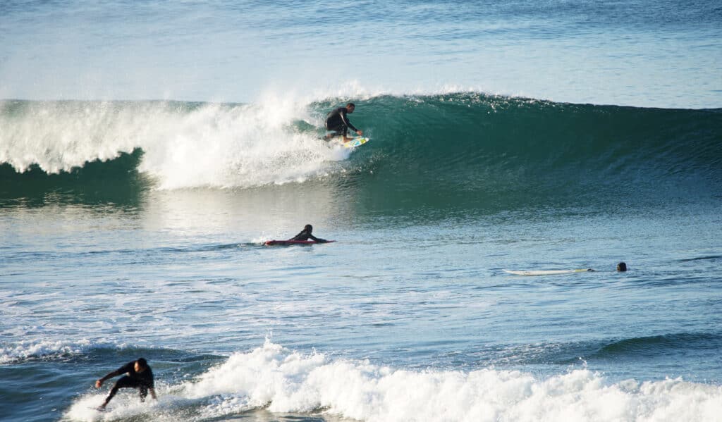 Surfing Nosara, fabulous at any age! Multiple surfers sharing the way.