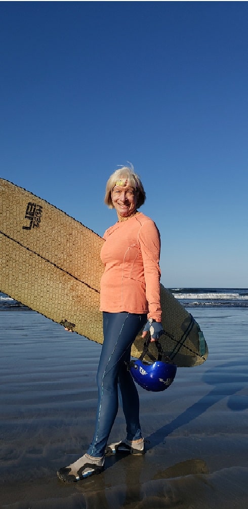 Debbie, surfing at 66. Also a world class sea-kayaker