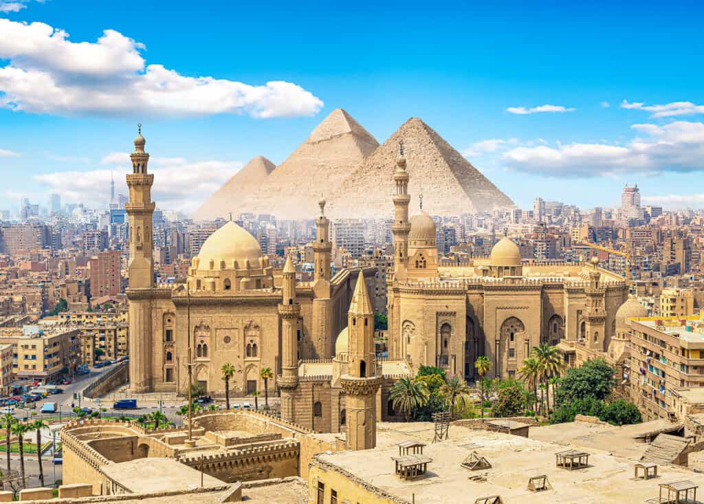 View of the Mosque Sultan Hassan in Cairo and pyramids. Egypt is on the top of my bucket list for a cultural immersion experience.