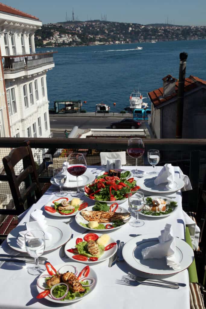 Turkish sea foods and Turkish appetizer foods on the restaurant table at Bosphorus in Istanbul, Turkey.