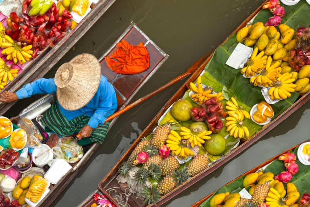 floating boats at the floating market as part of a foodie tour for those over 5